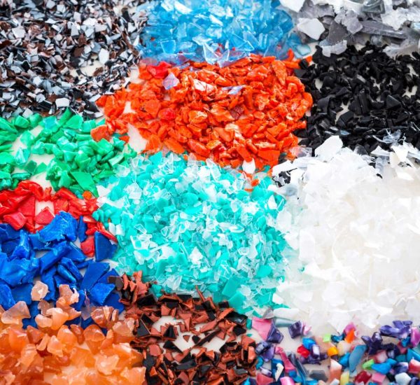 Different regrind polymers after milled in a shredder for recycling process